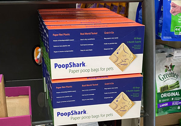 PoopShark Bags are available at Happy Paws!